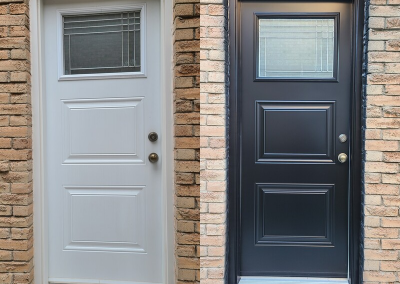White metal door after being painted black using a specialty paint used by window & door manufacturers